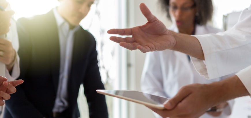 A group of healthcare professionals in a meeting