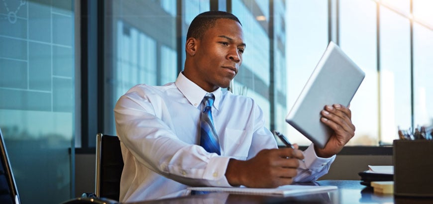 <span>Image of CEO looking at table </span>