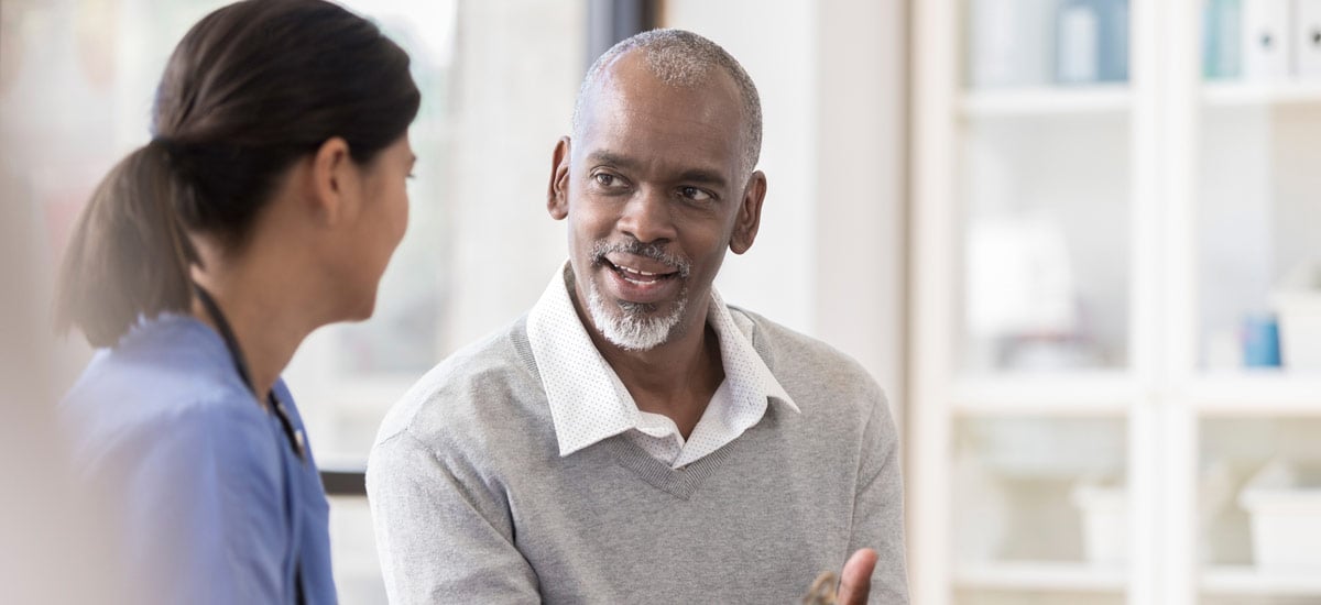 A patient speaking to a doctor